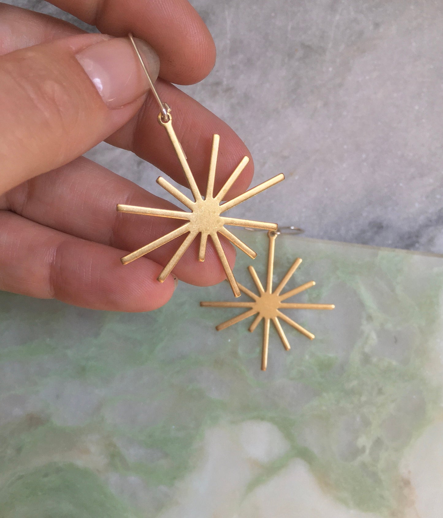 Brass starburst earrings