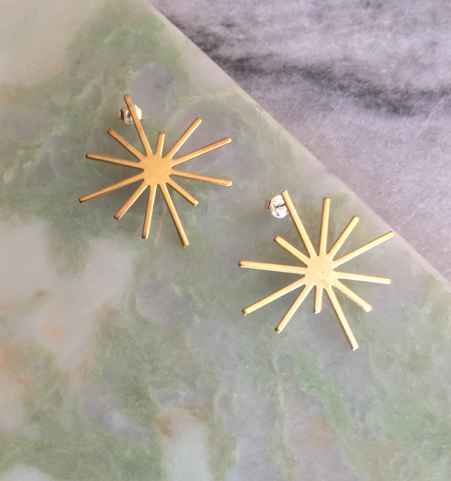 Brass starburst earrings